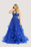 Woman wearing a blue Ballgown on a light gray background