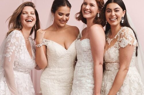Group of teens posing in stylish gowns at a prom dress shop ideal for shoppers searching prom dresses near me.