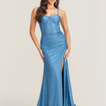 Elegant blue satin prom dress with sweetheart neckline and thigh-high slit – Valleta gown from Proms & Beyond.